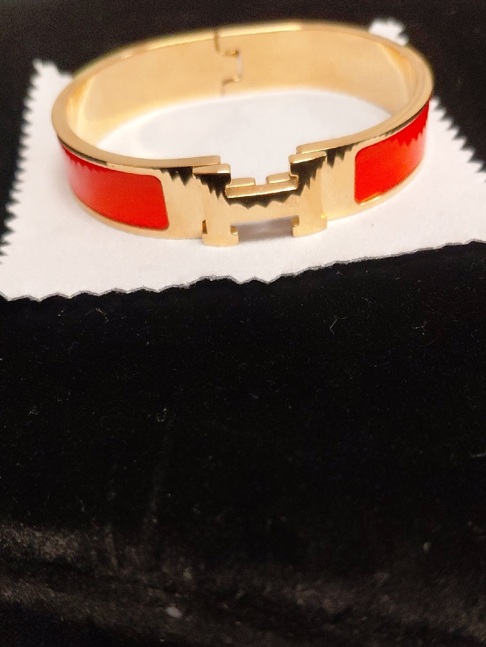 HERMES Gold And Enamel Signature Swing Top Bracelet Bangle